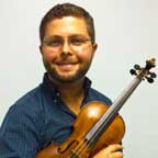 Photo of violin teacher Jaco Cronje with violin.